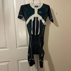 Large Pas Normal Studios Short sleeve skinsuit, green with white detail